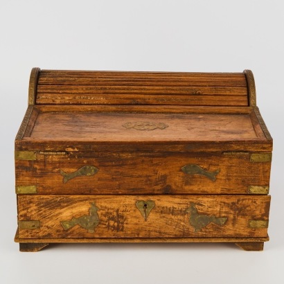 An Antique Teak and Brass Rolltop Writing Slope