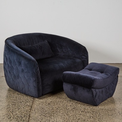 A Pair of Velvet Armchairs and Ottoman