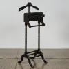 An Ebonised Wood Valet Stand