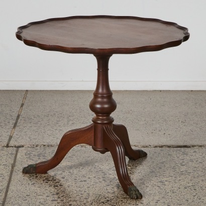 A Vintage Wine Table with Brass Lion Feet
