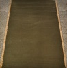 A Handwoven Nodi Tasseled Wool Rug