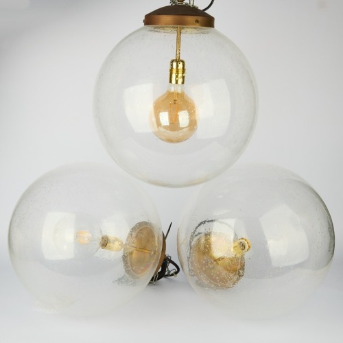 A Trio of Vinatge Spherical Glass Globe Pendants, Ex Vitrine