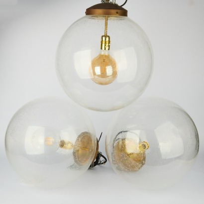 A Trio of Vinatge Spherical Glass Globe Pendants, Ex Vitrine