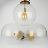 A Trio of Vinatge Spherical Glass Globe Pendants, Ex Vitrine