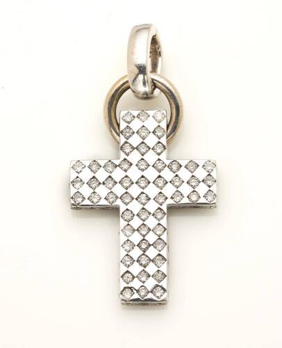 A diamond cross, set with eighty-four round brilliant cut diamonds. 18ct gold. Weight 5.1 grams. Length 3.0cm.