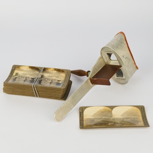 An Antique Kevuko Stereo Card Viewer with Stereoview Picture Cards