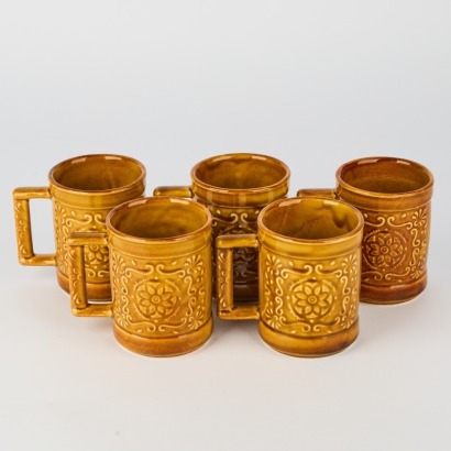 A Set of FIve Crown Lynn Honey Glaze Mugs