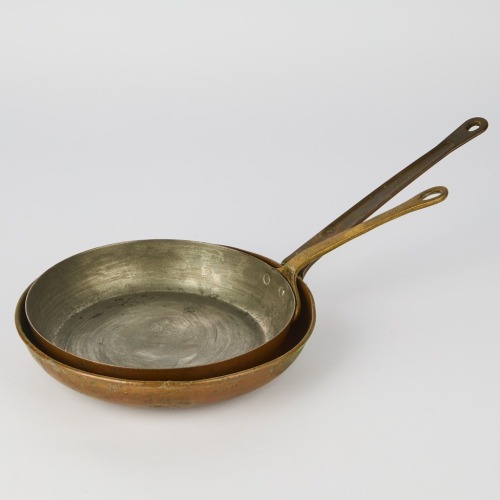 A couple of antique Copper Skillets