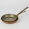 A couple of antique Copper Skillets