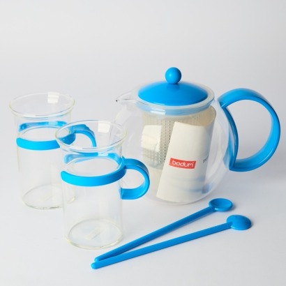 A Bodum 70 year Anniversary Boxed Tea Press, two cups and two Tall spoons Blue (never used)