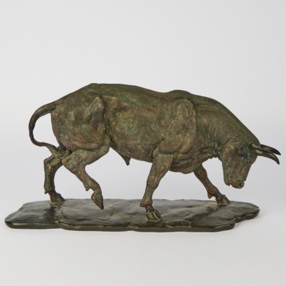 A Large Resin Bronzed Bull Sculpture