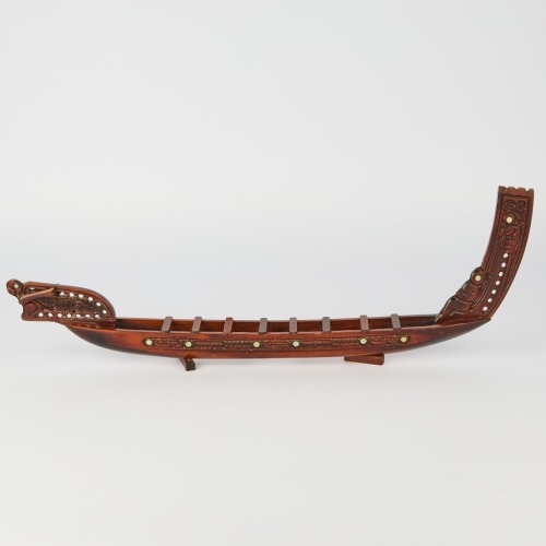 A Maori Waka Wood Carving