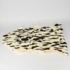 A Rabbit Fur Rug in Black and White