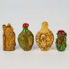 A Set of Four Chinese Jadeite Snuff Bottles of Various Colors