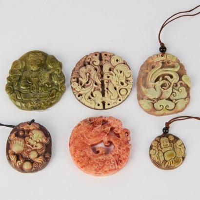 A Group of Six Chinese 20th Century Carved Jade Small Pendants