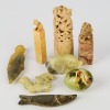 A Group of Eight Chinese 20th Century Carved Jade Small Items
