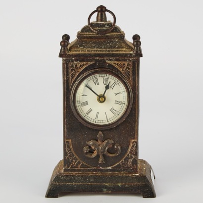 A Cast Iron Mantel Clock in Antique Style, Working