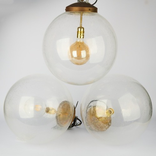 A Trio of Vinatge Spherical Glass Globe Pendants, Ex Vitrine
