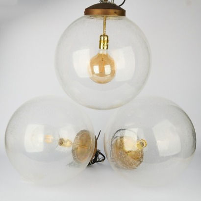 A Trio of Vinatge Spherical Glass Globe Pendants, Ex Vitrine