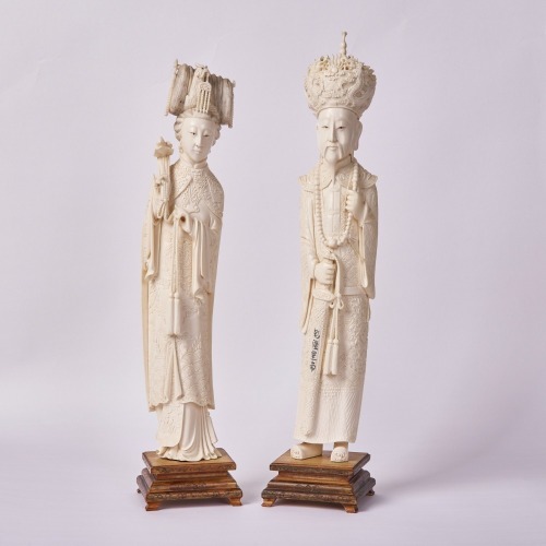 A Pair of Chinese 20th Century Bone Carvings of Ancient Figures