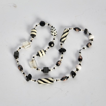 A Glass and Plastic Beaded Necklace