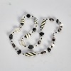 A Glass and Plastic Beaded Necklace