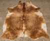 A Brown Cow Hide Rug