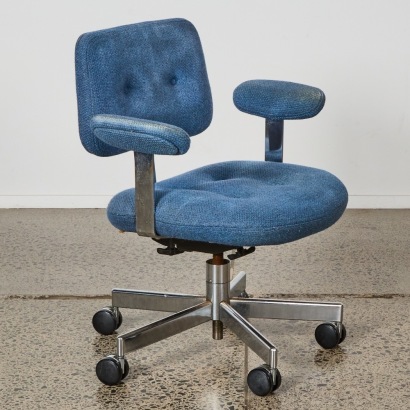 A Mid-century Armchair by Harvard Interiors USA