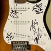 A Guitar Signed by Six-60 - 2
