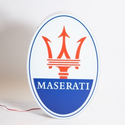 An Illuminated Maserati dealer sign