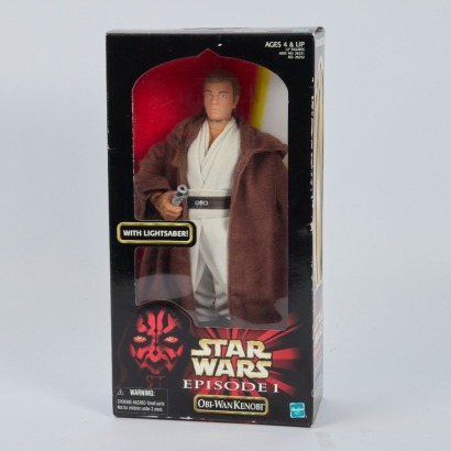 An Obi-Wan Kenobi with Lightsaber Star Wars Episode I Figure