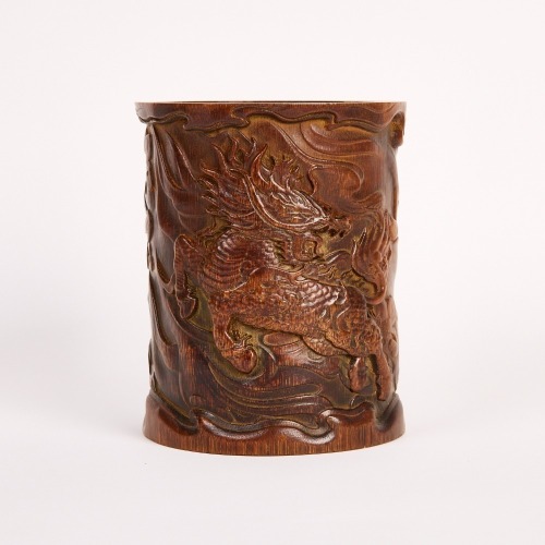 A Chinese Qing Dynasty Carved Bamboo 'Qilin' Brush Pot