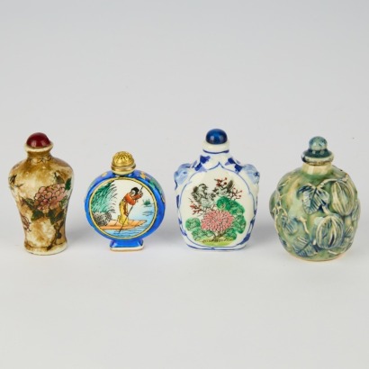 A Set of Four Chinese Porcelain Snuff Bottles