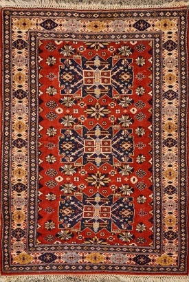 An OCM Indian Hand-Knotted Wool Rug