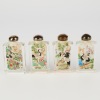 A Set of Four Chinese Inside-Painted Glass 'Crane ' Snuff Bottles