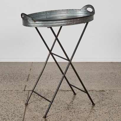 An Oval Butler's Tray with Folding Base