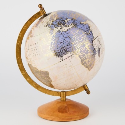 A Vintage World Globe with Brass and Wooden Fixtures