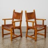 A Pair of Mid-Century Caryngo Style Saddle Leather Chairs