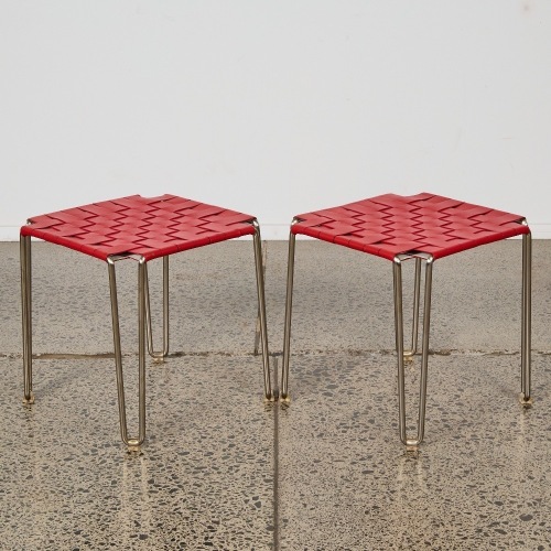A Pair of Red Woven Vinyl Stools