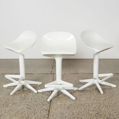 A Trio of Kartell Spoon Bar Stools