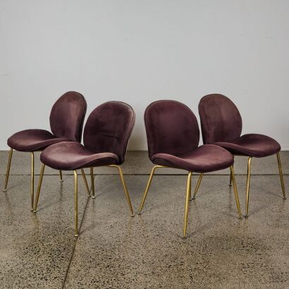 A Set of Four Mid-Century Style Dining Chairs