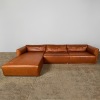 A Tim Webber Design Cognac Three-Piece Leather Sofa A/F