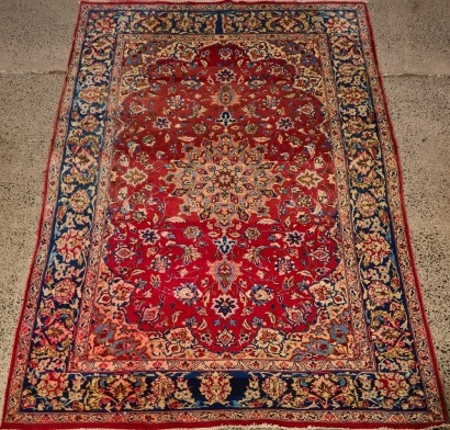 A Large Vintage Hand-Knotted Persian Rug