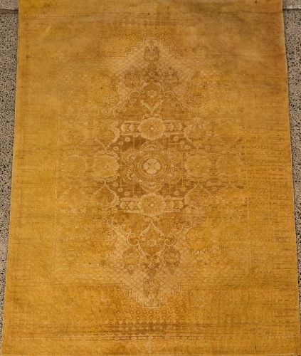 A Hawthorne Collections Distressed Persian Rug