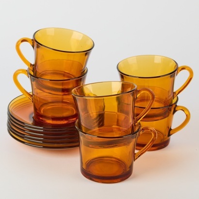 A Set of Six Cups and Saucers in Amber by Duralex