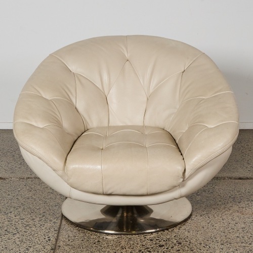 A White Leather Swivel Armchair