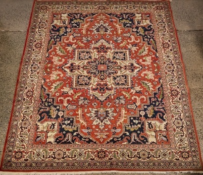 A Romanian Wool Rug in the Heriz Pattern