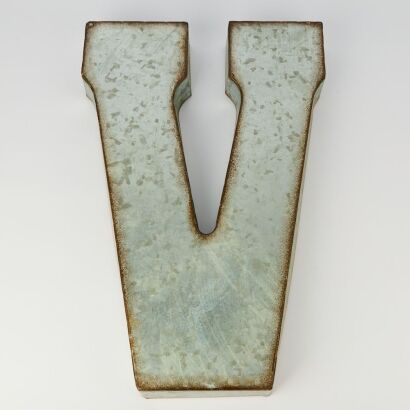 A Large Metal Letter Wall Sign