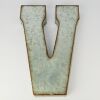 A Large Metal Letter Wall Sign