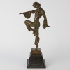 A Metal Statue in the Style of Demetre Chiparus